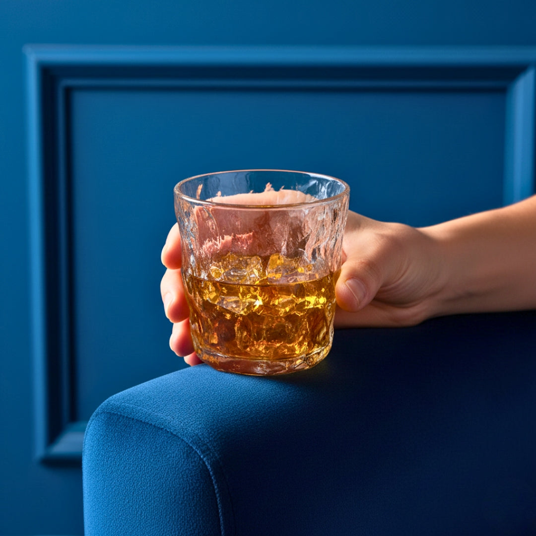 A man holding glacier textured glass